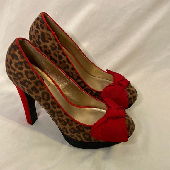 G by Guess Shoes - G by Guess  Platform Stiletto Heels Leopard print with red bow  Size 7.5